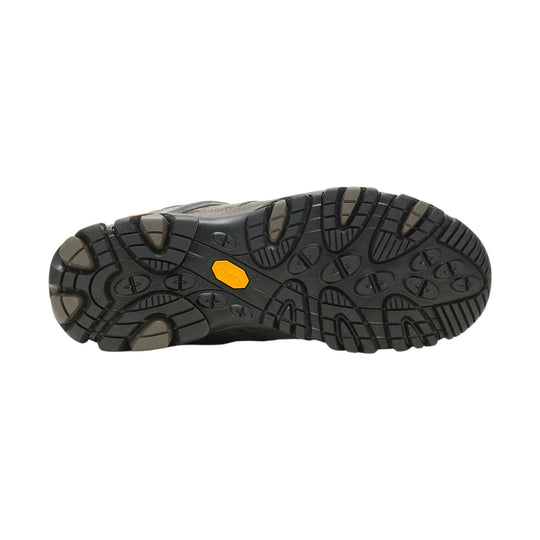 Black hiking boot outsole with deep tread and tan traction lugs