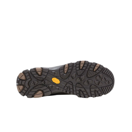 Black hiking boot outsole with tan traction lugs and a yellow Merrell logo