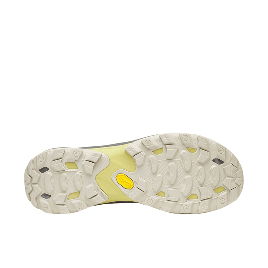 Off-white hiking shoe outsole with deep tread and yellow Vibram logo