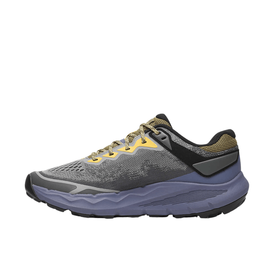 Gray trail running shoe with black trim, yellow lace loops, and a purple cushioned midsole