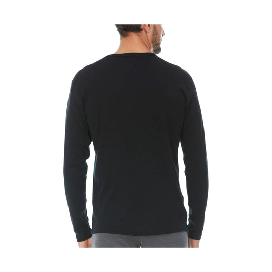 Black long-sleeve crewneck shirt shown from the back on a model