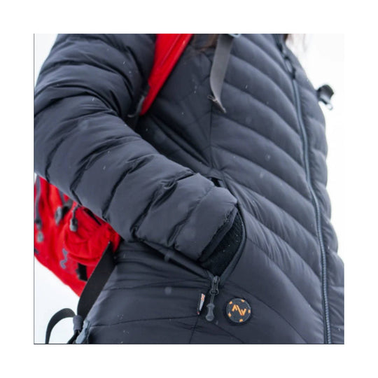 Black quilted puffer jacket with hood, front zipper, and round chest logo patch