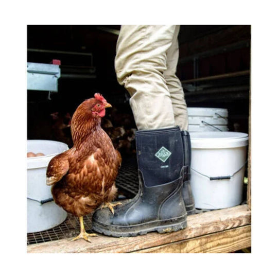 Black pull-on rubber work boot with a diamond logo and treaded sole