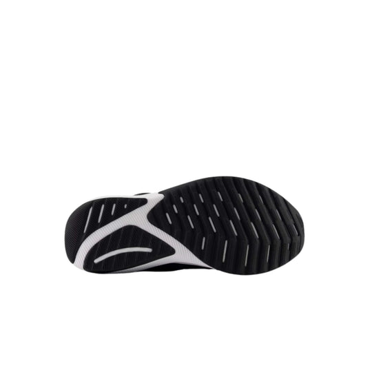 Black shoe outsole with white curved support section and grooved tread