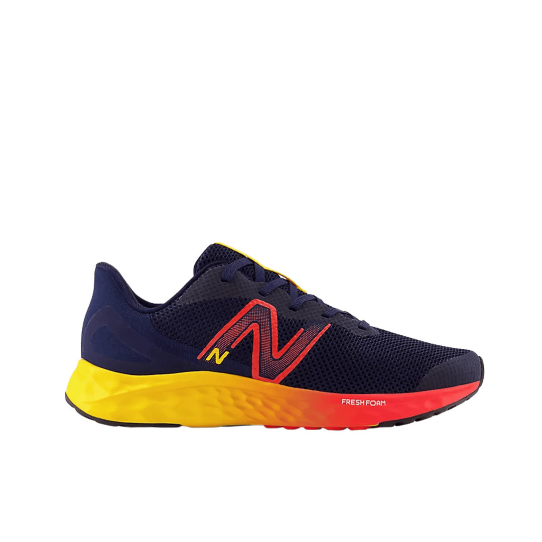 Navy athletic shoe with red and yellow midsole, mesh upper, and visible Fresh Foam text