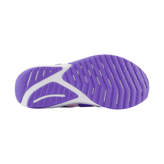Purple shoe outsole with white curved midsole and traction grooves