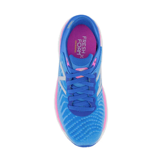 Blue running shoe with pink accents, mesh upper, and blue laces, shown from above