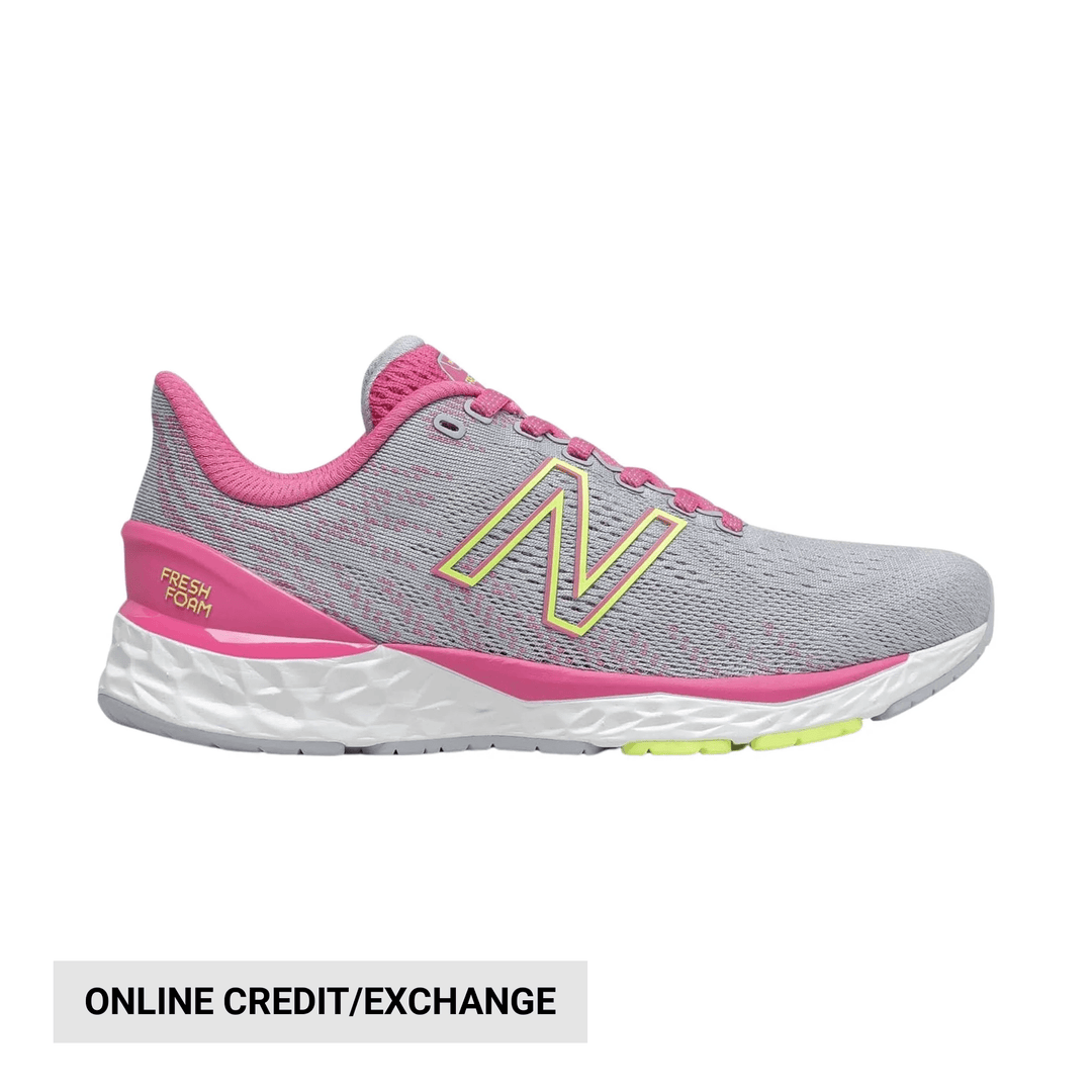 Gray running shoe with pink trim, pink laces, and a white cushioned sole
