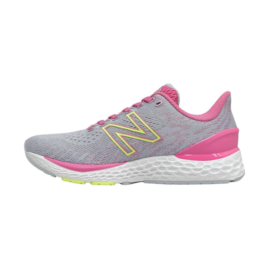 Gray and pink athletic running shoe with knit upper, large side logo, and white textured sole
