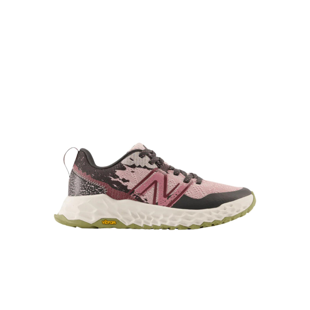 Pink and black trail running shoe with white midsole and olive outsole, shown in side profile