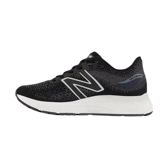 Black running shoe with white midsole and large side logo, side view