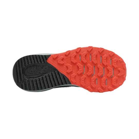 Running shoe outsole with black forefoot tread and bright orange heel tread