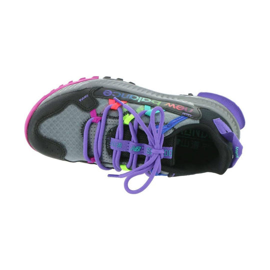 Gray and black trail running shoe with purple laces and multicolor accents, shown from above