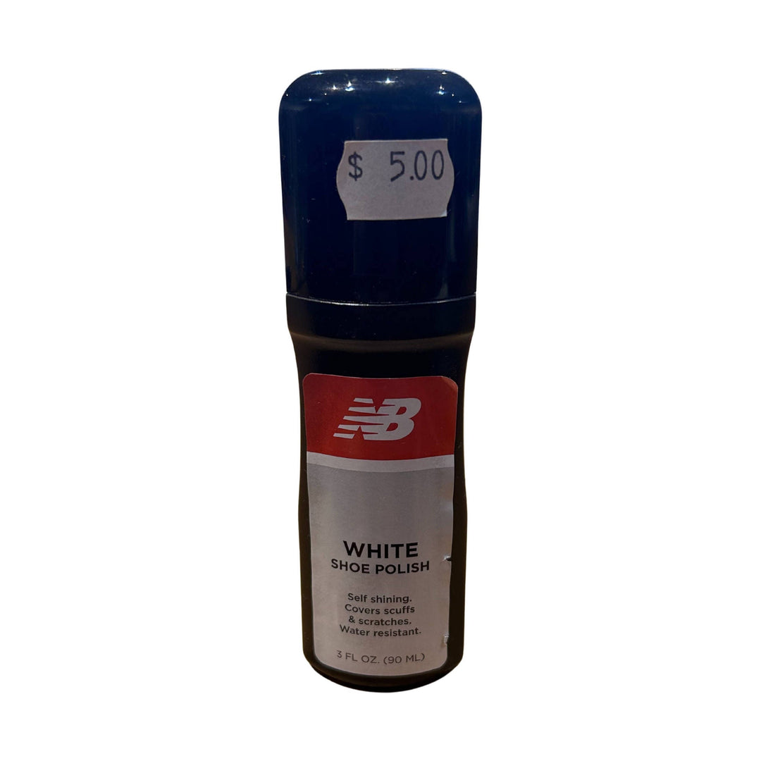 Bottle of white shoe polish with a $5.00 price sticker