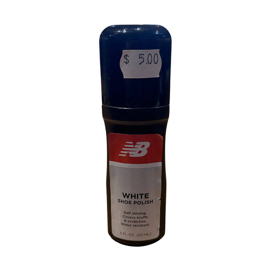 Bottle of white shoe polish with a $5.00 price sticker