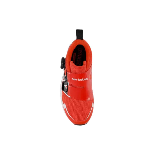 Red and black kids' athletic shoe with a BOA dial and pull tab, shown from above
