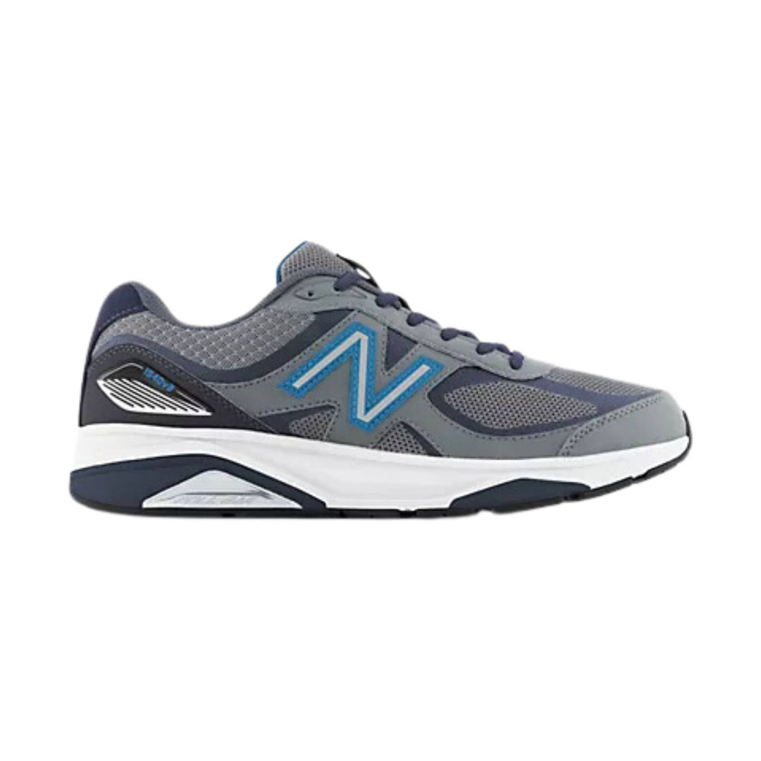 Gray and navy running shoe with blue side logo and white cushioned sole
