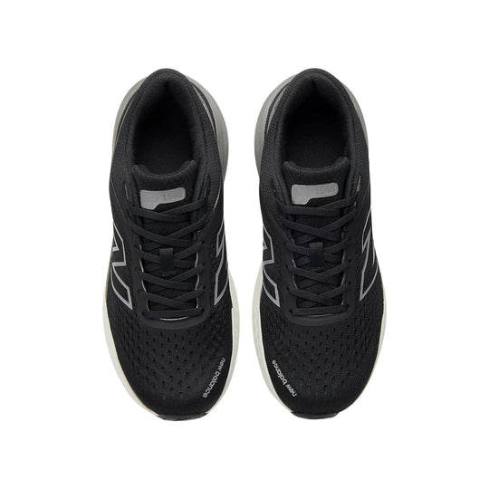 Black running shoes with gray side accents, top view