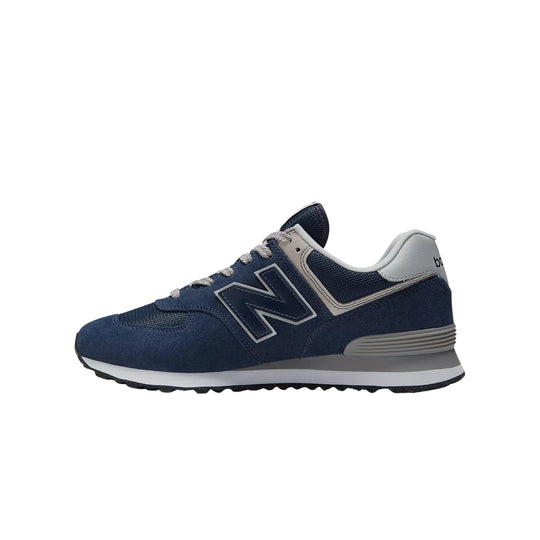 Navy and gray low-top sneaker with mesh panels, suede overlays, white midsole, and large side logo