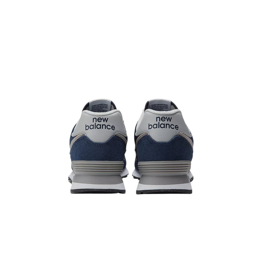 Pair of navy and gray low-top sneakers shown from the heel, with New Balance logos on the back