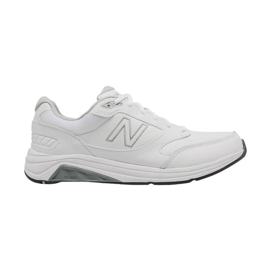 White low-top walking shoe with mesh panels, lace-up closure, and gray sole details