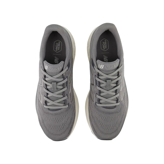 Gray running shoes seen from above with laced uppers and Fresh Foam 680 labels