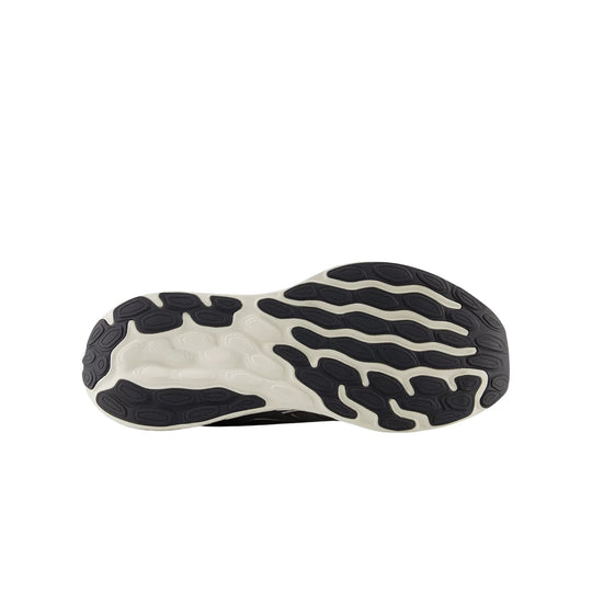 Black and white running shoe outsole with wavy tread pattern