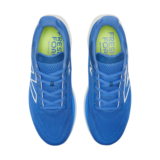 Blue running shoes viewed from above with white side logos and lime green insoles.