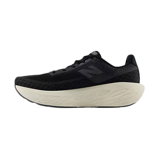 Black running shoe with a thick cream midsole and low-profile knit upper