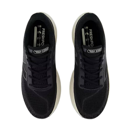 Black running shoes with white midsoles and laces, shown from above