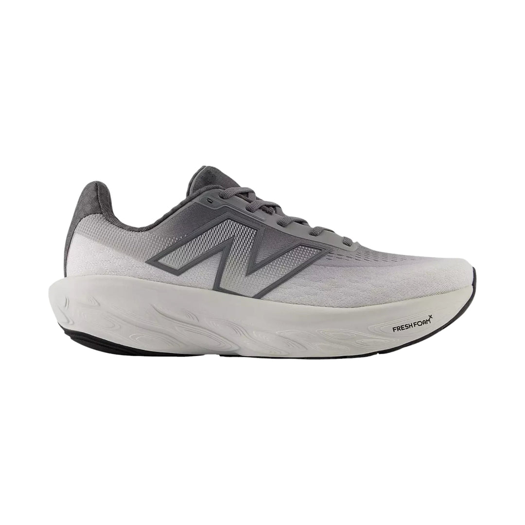 Gray New Balance running shoe with a white cushioned sole and black outsole, side view
