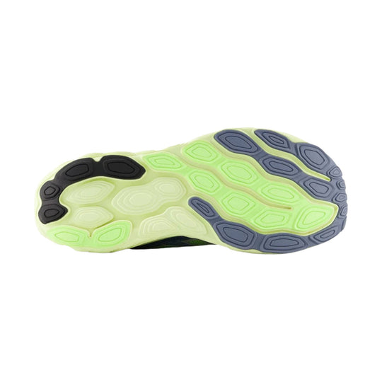 Running shoe outsole in lime green, black, and gray with rounded tread pods