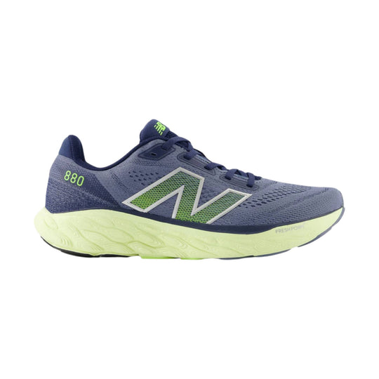 Blue running shoe with lime green foam sole and large side logo