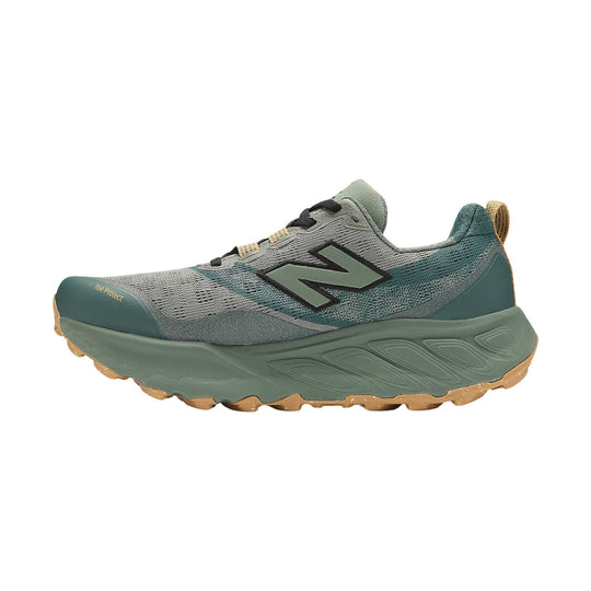 Gray and teal trail running shoe with black laces, a large side logo, and a gum outsole