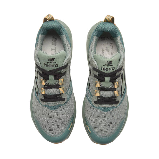 Pair of gray and teal trail running shoes with black laces and visible "hiero" branding