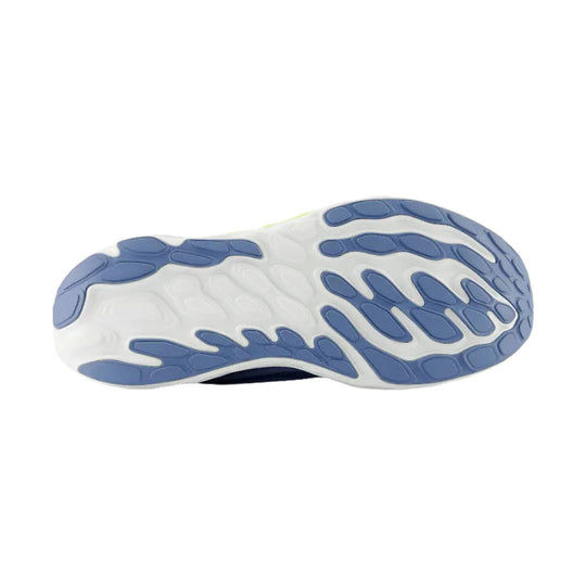 White running shoe outsole with blue traction pods and curved tread pattern