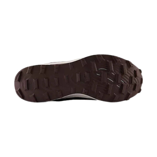 Brown lugged shoe outsole with deep tread pattern