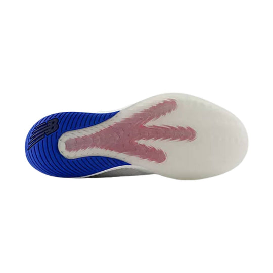 Blue and white shoe outsole with pink traction pattern and New Balance logo