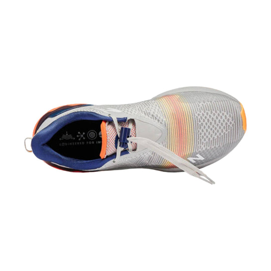 Gray running shoe with blue inner lining, white laces, and orange accents, shown from above