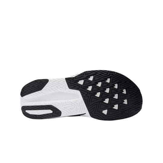 Black and white running shoe outsole with triangular tread pattern