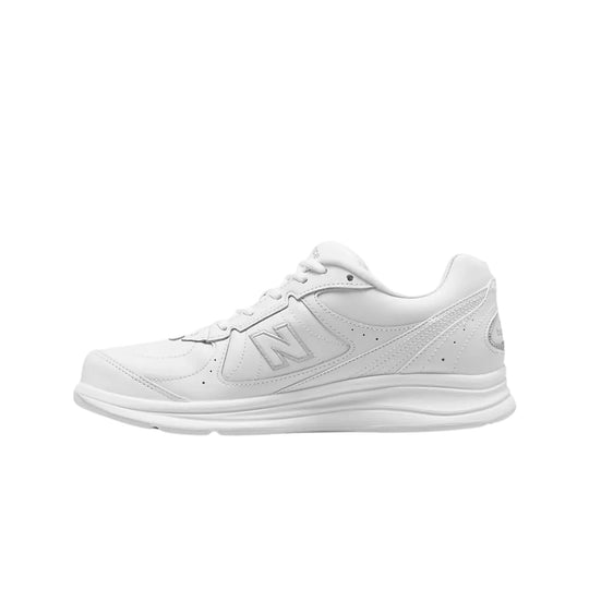 White low-top walking sneaker with lace-up closure and gray logo accents, side view