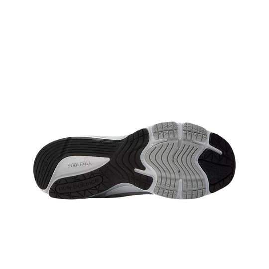 Shoe outsole with black and gray rubber tread and visible New Balance and FuelCell markings