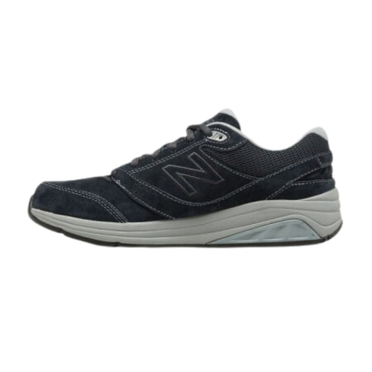 Navy walking sneaker with mesh panels, suede overlays, and a white cushioned sole