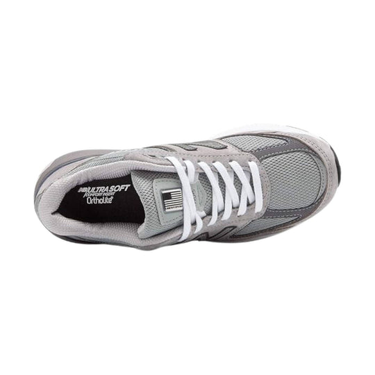 Gray and white athletic sneaker with mesh panels, white laces, and visible cushioning label