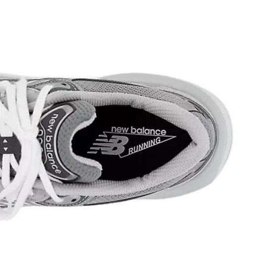 Gray and white running shoe with white laces, black insole, and New Balance Running branding on the tongue