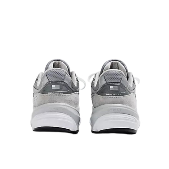Pair of gray running shoes shown from the back with white midsoles and visible MADE IN U.S.A. text