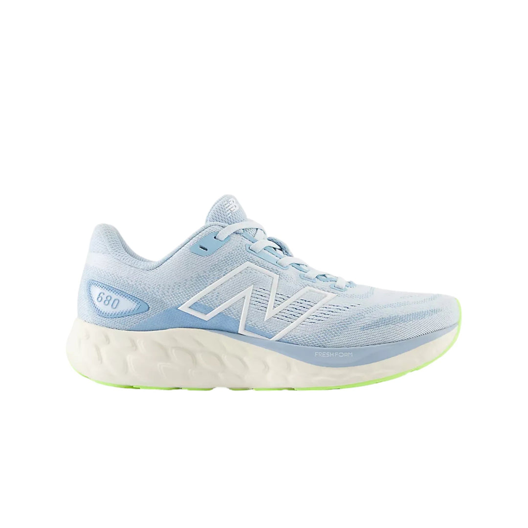 Light blue and white running shoe with a thick cushioned sole and side logo