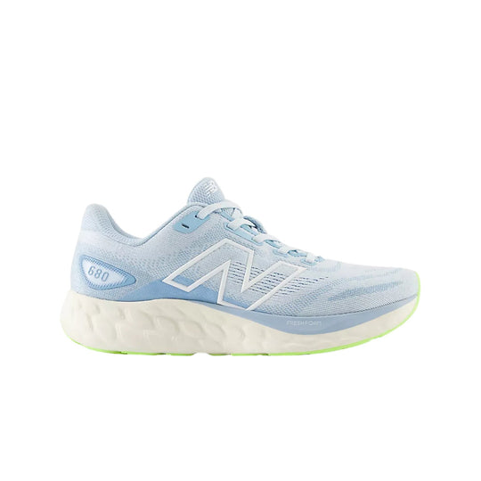 Light blue and white running shoe with a thick cushioned sole and side logo