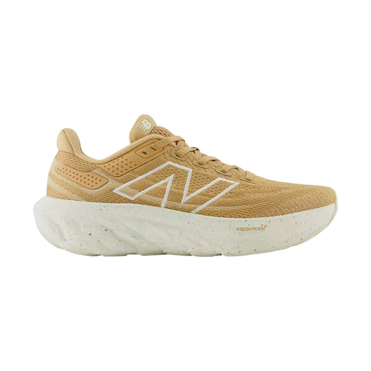 Tan running shoe with white foam midsole and large side logo