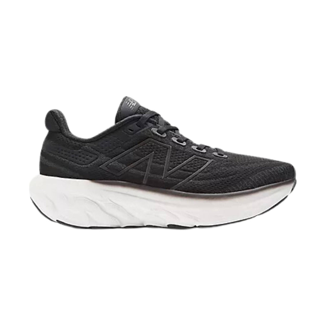 Black mesh running shoe with a thick white cushioned sole, side logo, and lace-up upper